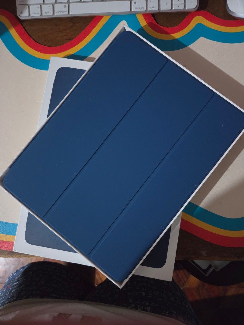 Original Apple Smart Folio Case for iPad Pro 12.9 M1 & M2 (3rd generation, 4th generation, 5th generation, 6th generation) (Category: Cases & Sleeves) located in Manila. Submitted by razelysonn (Listing ID 1459450612, Image 2). Description: FIXED PRICE - Below SRP - Available in blue, white, orange Location: Binondo Manila.