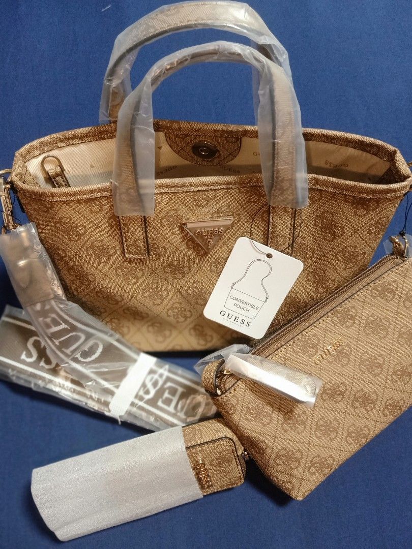 Original GUESS handbag (mocha brown) (Category: Luxury Bags & Wallets) located in Manila. Submitted by tjgochum2342290 (Listing ID 1459363710, Image 1). Description: Original GUESS hand bag (mocha brown) BRAND NEW GUESS BAG Model: Latona mini FULL SET: - Handbag - Strap - Pouch - Mini wallet - Dust cover PAYMENT METHOD: - Gcash DELIVERY: - Lalamove - Gogo Xpress (buyer will carry shipping fee) (message seller for inquiry/negotiations).