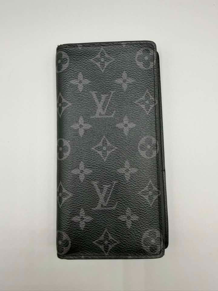 ORIGINAL Louis Vuitton Brazza Wallet – Monogram Eclipse (Category: Luxury Bags & Wallets) located in Caloocan City. Submitted by epicfalcon.e5a84c (Listing ID 1459340167, Image 2). Description: - Authentic Louis Vuitton Monogram Long Wallet - Made in France - Iconic Monogram pattern - Ample card slots for organization - Secure zippered compartment for coins.