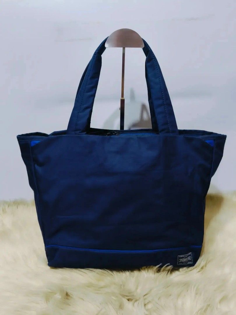 Original Porter Yoshida & Co. Navy Tote Bag (Category: Shoulder Bags) located in Caloocan City. Submitted by secondhand_shop2 (Listing ID 1459403694, Image 1). Description: Sale❗Sale❗Sale❗ Original PORTER Navy Blue Large ykk zipper Nylon 📌First to pay!.