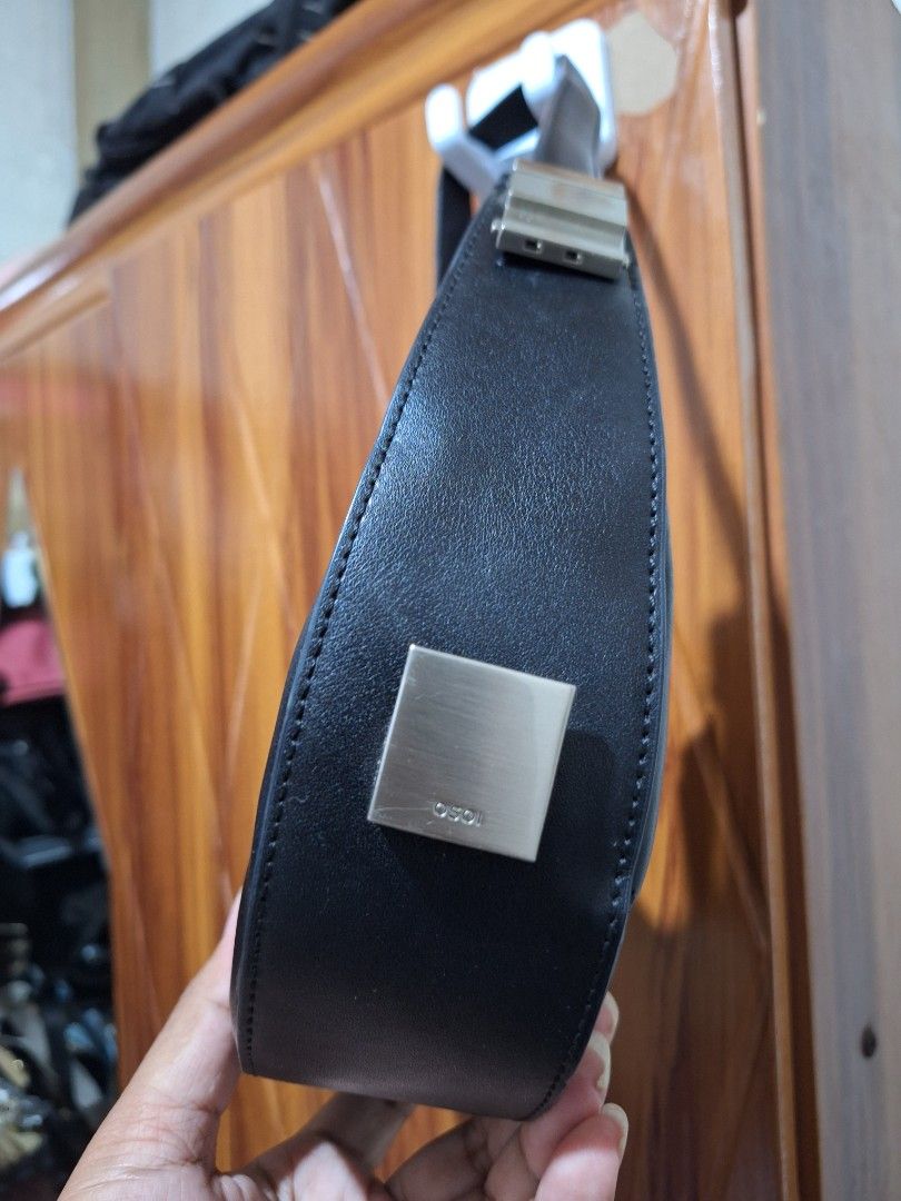 Osoi Black Crescent Shoulder Bag with Silver Hardware (Category: Luxury Bags & Wallets) located in Manila. Submitted by abj_thriftshop (Listing ID 1459344622, Image 3). Description: - Black crescent shoulder bag - Genuine leather material - Secure zipper closure - Elegant silver hardware details - Subtle embossed logo on the side - Simple and chic design - Ideal for daily use.