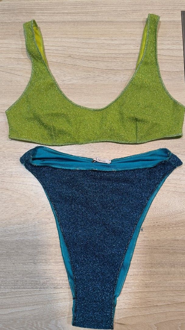 Oséree Glitter Bikini Set Teal & Lime Green (Category: Bikinis & Swimsuits) located in Makati City. Submitted by fashion_thrift_ (Listing ID 1459289501, Image 3). Description: Sparkly Oseree bikini set. Teal blue bikini top and lime green bikini bottoms. Both pieces have a glittery finish. The top has a scoop neck and tank straps. The bottoms are high-waisted. Great for the beach or pool..