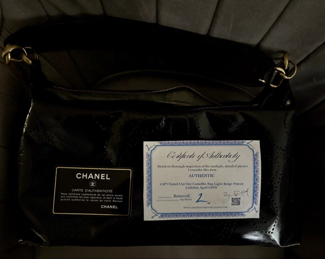 Perforated Camellia Shoulder bag (Category: Luxury Bags & Wallets) located in Bacoor. Submitted by grandfire.02c841 (Listing ID 1459303856, Image 1). Description: - Authentic Chanel Hobo Bag - Color: Black - Material: Patent Leather, retouched by Prime Restore (paid 10k for this!) - Design: Camellia Cut-out Details - Hardware: Gold - Closure: Zipper - Includes: Certificate of Authenticity (COA), authenticity card, no more hologram - Ideal for: Ev