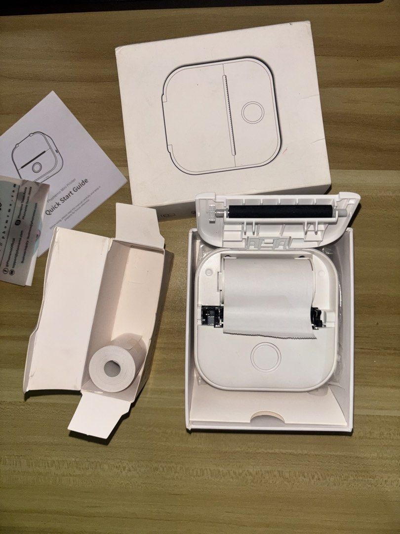Phomemo Mini Printer T02 with Printer Paper | Compatible with IOS and Android (Category: Printers, Scanners & Copiers) located in Manila. Submitted by _mica3 (Listing ID 1459365229, Image 3). Description: Inclusions: > Includes 2 roll of thermal paper (One unused, one inside the printer) > Original box and manual included !! PRICE IS STILL NEGOTIABLE !! .