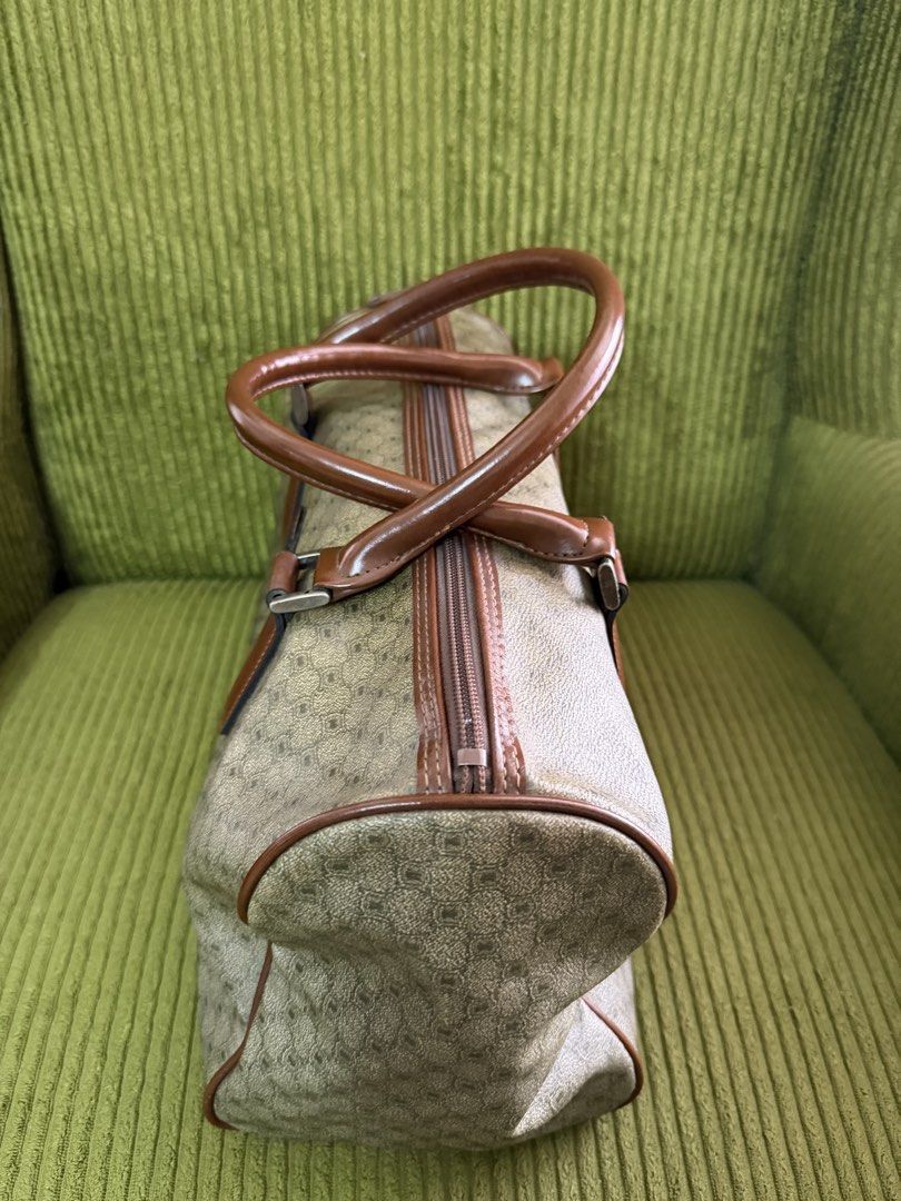 Pierre Cardin Paris Monogram Doctor Bag (Category: Luxury Bags & Wallets) located in Manila. Submitted by lovelystuffmaycomeandgo (Listing ID 1459339359, Image 3). Description: - Vintage Pierre Cardin doctor’s bag - Classic monogram print - Brown leather trim and handles - Zipper closure - Ideal for weekend trips or carry-on - Minor wear on bottom corners and leather trim, consistent with age Length 14 in Width 6 in Height 8 in Handle 5 in dropdo
