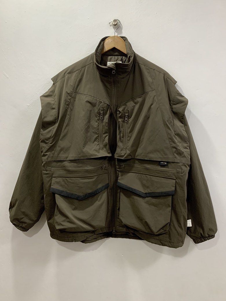 PIN SKTBS CORDURA TACTICAL MULTIPOCKET JACKET (Category: Coats, Jackets and Outerwear) located in Cavite. Submitted by ___layern0ne (Listing ID 1459473956, Image 1). Description: About the product: It is an outdoor-focused utility jacket designed with a distinctive multi-pocket gorpcore layout, heavy-duty Cordura advanced fabric trim, vertical zip chest compartments, and layered expanding cargo pocket Tagged Size: S (oversized) Armpit to Armpit (