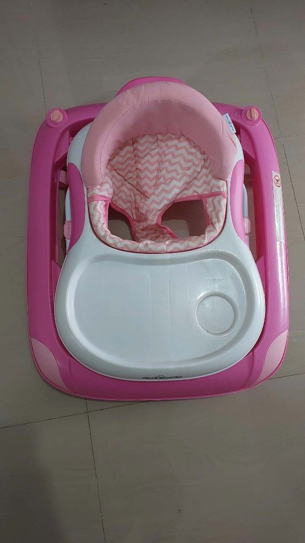 Pink Baby Walker (Category: Infant Playtime) located in Manila. Submitted by sirineedit (Listing ID 1459456639, Image 3). Description: - Pink baby walker - White tray with cup holder - Padded seat for comfort - Folds flat for easy storage - Ideal for babies learning to walk - Easy to clean.