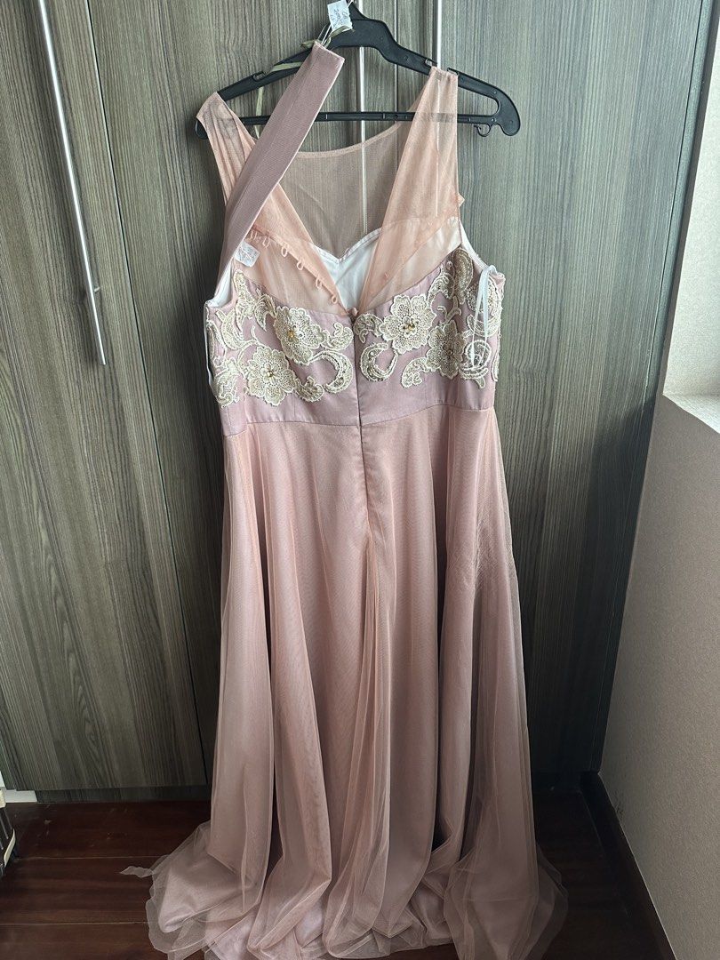 Pink Embellished Tulle Evening Gown (Category: Evening dresses & gowns) located in Alicia. Submitted by muffinberry821 (Listing ID 1459351546, Image 2). Description: - Beautiful pink tulle gown - Intricate beadwork and embroidery on bodice and sleeves - Sheer neckline and long sleeves - Ideal for formal events or as a bridesmaid dress - Zipper closure at the back - Flowy skirt with a slight train.