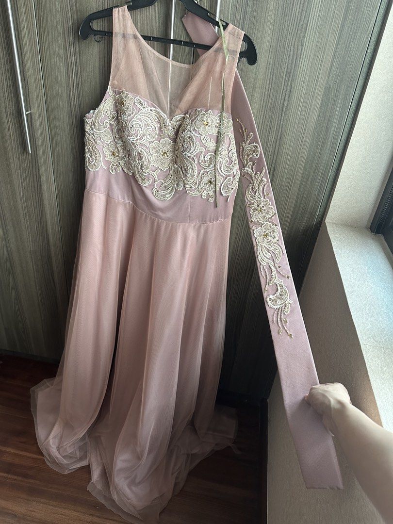 Pink Embellished Tulle Evening Gown (Category: Evening dresses & gowns) located in Alicia. Submitted by muffinberry821 (Listing ID 1459351546, Image 1). Description: - Beautiful pink tulle gown - Intricate beadwork and embroidery on bodice and sleeves - Sheer neckline and long sleeves - Ideal for formal events or as a bridesmaid dress - Zipper closure at the back - Flowy skirt with a slight train.
