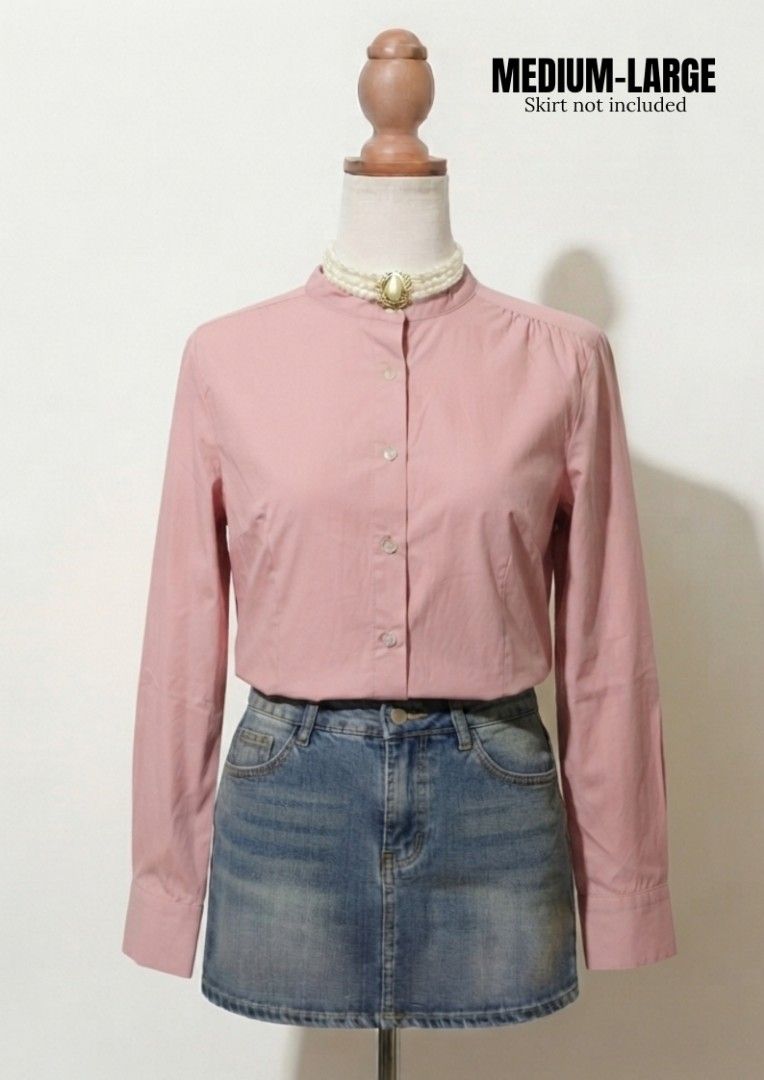 Pink Long Sleeve Button Up Shirt (Category: Tshirts & Polo Shirts ) located in Vintar. Submitted by roweeflores.flowerpower (Listing ID 1459352615, Image 1). Description: - Pink long sleeve shirt - Mandarin collar - Button-up front - Size: Medium-Large (M-L) - Comfortable cotton blend fabric - Versatile: perfect for casual wear or dressing up - Pairs well with jeans or skirts - Selling as is.