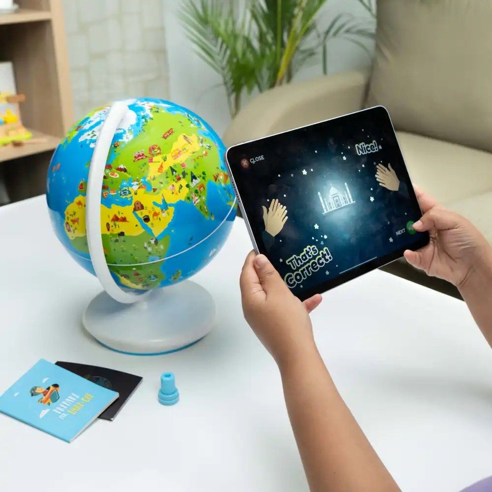 PlayShifu Orboot Earth Globe + Orboot App (Category: Cases & Sleeves) located in Pasay City. Submitted by jmercs04 (Listing ID 1459489830, Image 2). Description: - Interactive globe and app for exploring the world. - Discover over 400 wonders and 1000+ facts. - Learn about animals, cultures, inventions, and more. - Features an augmented reality (AR) experience via tablet or phone. - Fun and educational for kids to learn geography and world facts.