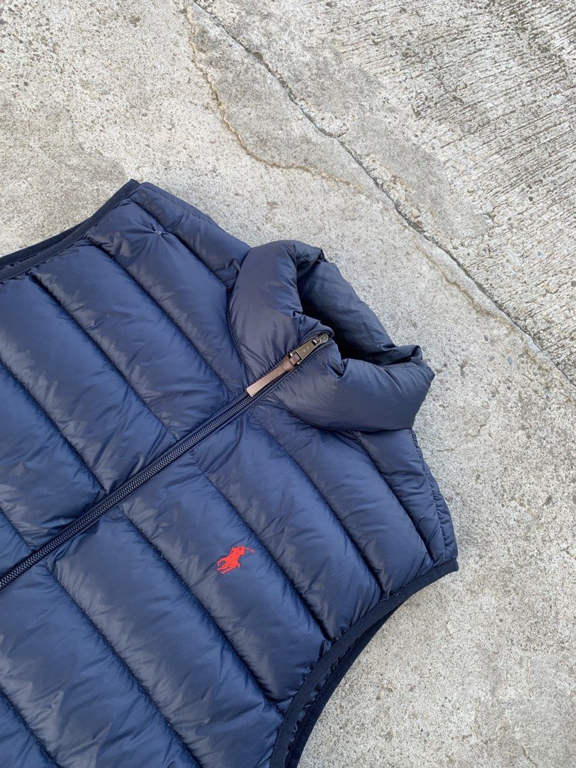 POLO RALPH LAUREN PACKABLE DOWN PUFFER VEST(authentic) (Category: Vests) located in Kalibo. Submitted by thriftyfinds09 (Listing ID 1459445982, Image 3). Description: POLO RALPH LAUREN PACKABLE DOWN PUFFER VEST(authentic) Excellent condition Size L 23 width 26.5 length Need wash Issue: repaired pinholes Color rate:9.8/10 .