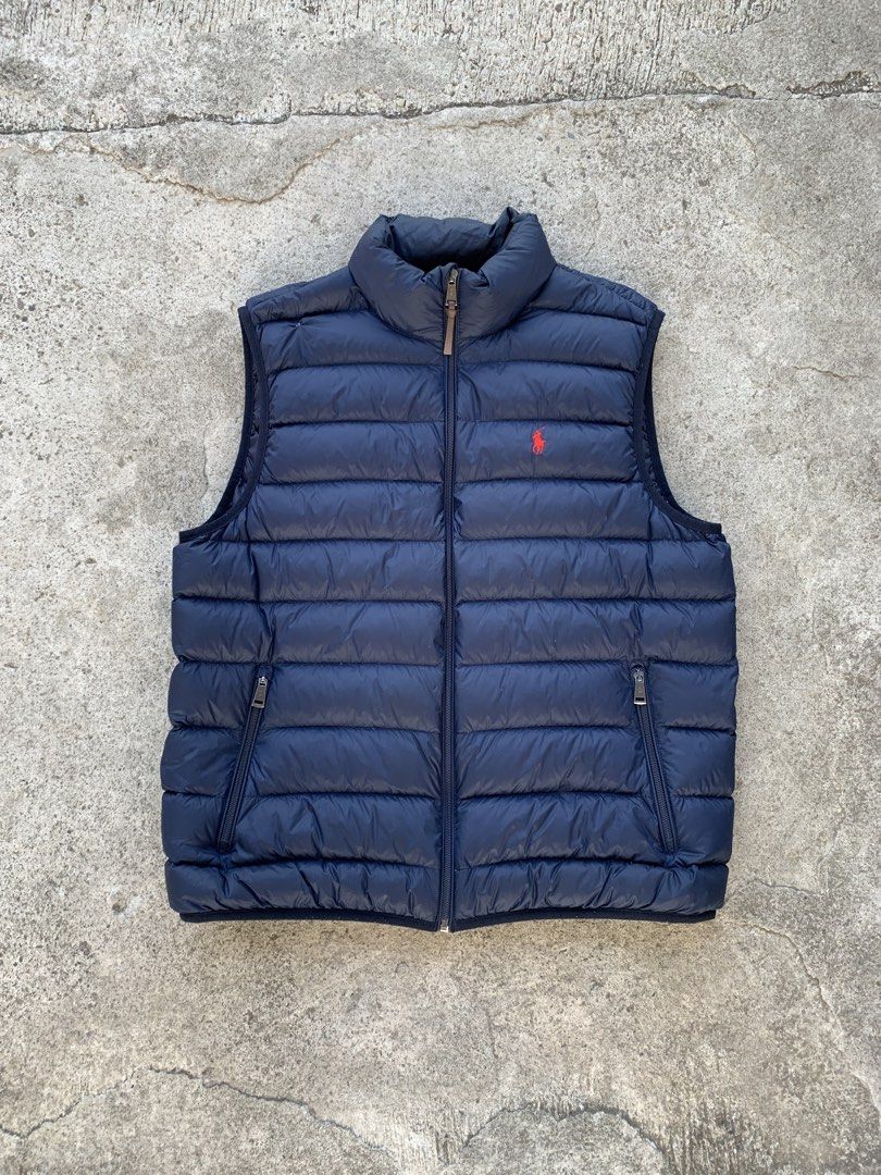 POLO RALPH LAUREN PACKABLE DOWN PUFFER VEST(authentic) (Category: Vests) located in Kalibo. Submitted by thriftyfinds09 (Listing ID 1459445982, Image 1). Description: POLO RALPH LAUREN PACKABLE DOWN PUFFER VEST(authentic) Excellent condition Size L 23 width 26.5 length Need wash Issue: repaired pinholes Color rate:9.8/10 .