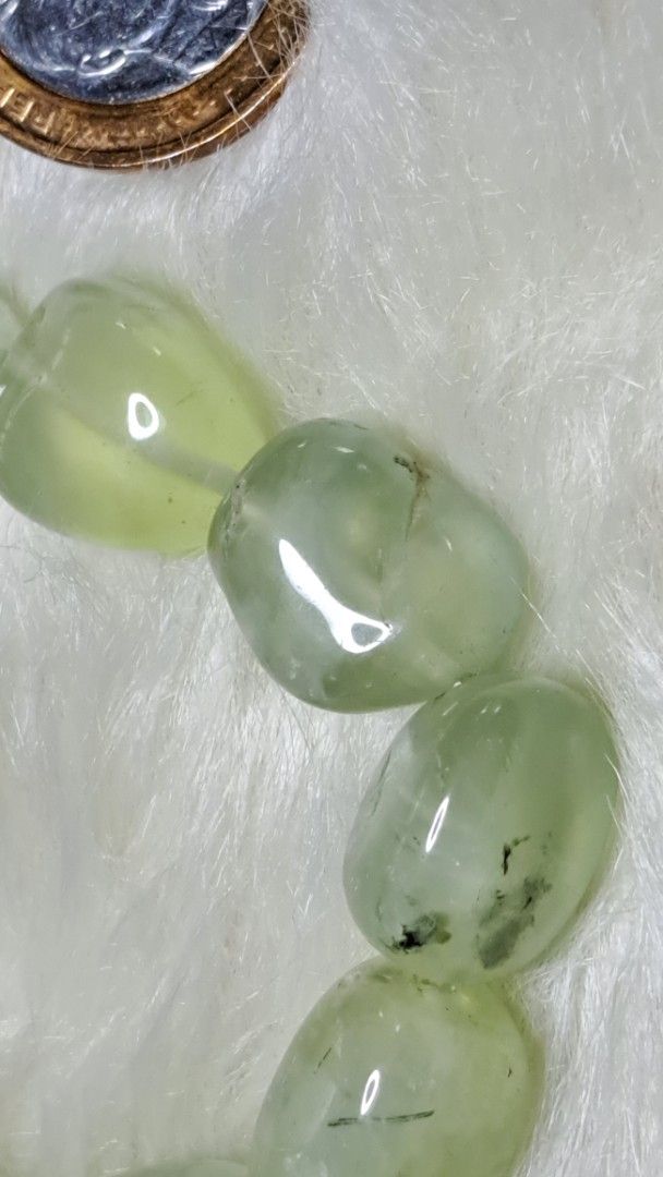 Prehnite Smooth Nugget Bracelet (Category: Bracelets) located in Quezon City. Submitted by crystallinehaven (Listing ID 1459353921, Image 2). Description: - Genuine Prehnite nugget bracelet ♦️p1 only ♦️p880 - Smooth, tumbled stones with translucent green color - Unique natural inclusions in each bead - Stretchy elastic for comfortable wear - Versatile for everyday or special occasions - A beautiful addition to any crystal collection 💥READ FIRST 