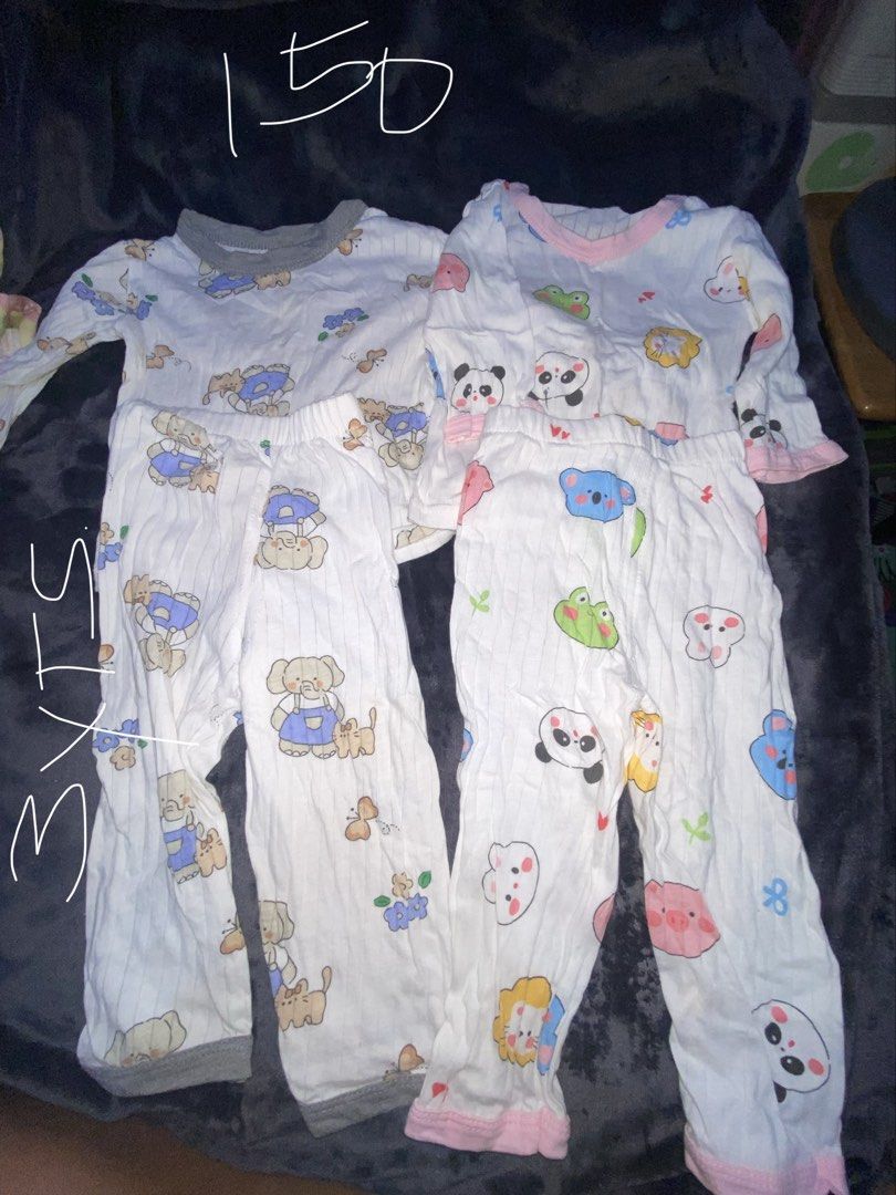 Preloved Girl Clothes (Part3) (Category: Babies & Kids Fashion) located in Manila. Submitted by ea0113 (Listing ID 1459297334, Image 3). Description: - Bundle of 5 baby pajama sets - Long sleeves and pants for full coverage - Cute prints: dinosaur, bear, lion, elephant, panda - Made from soft, comfortable fabric for a good night's sleep - Ideal for daily wear or as a thoughtful baby gift.