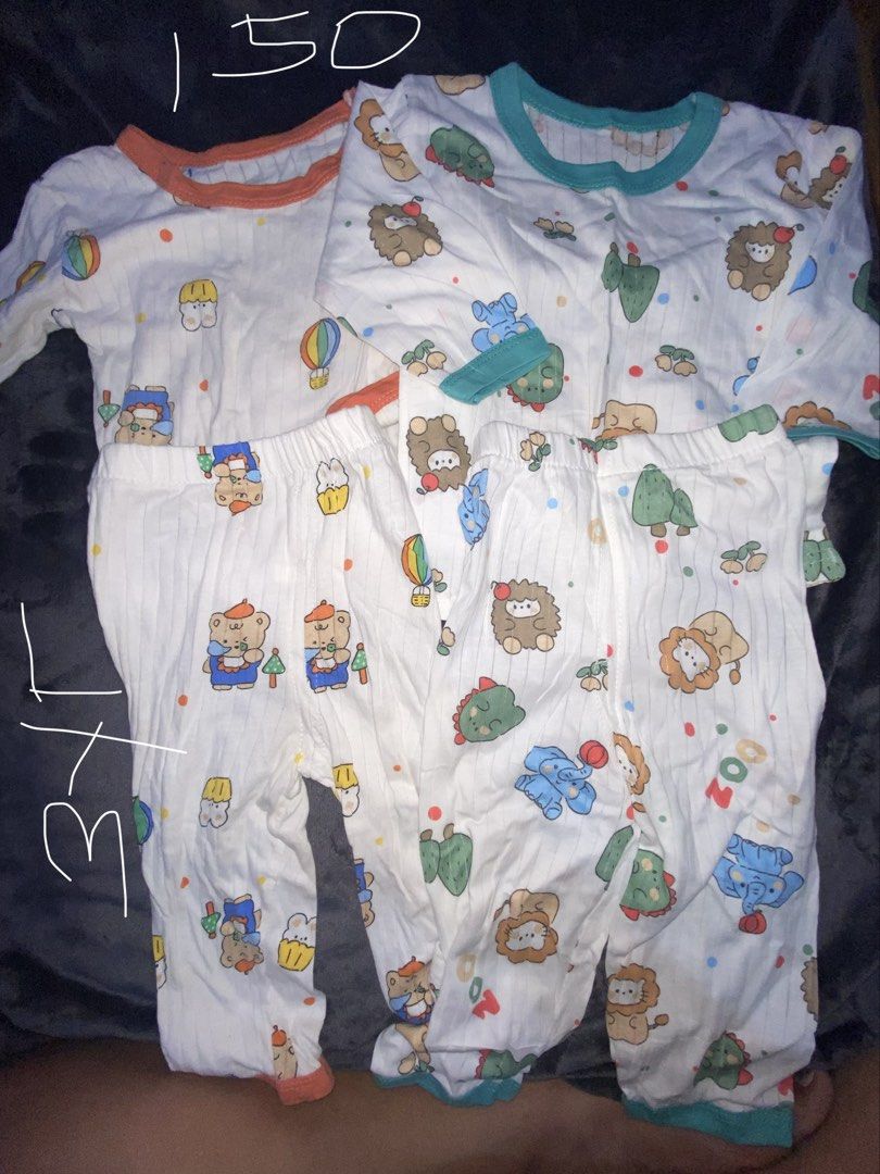 Preloved Girl Clothes (Part3) (Category: Babies & Kids Fashion) located in Manila. Submitted by ea0113 (Listing ID 1459297334, Image 2). Description: - Bundle of 5 baby pajama sets - Long sleeves and pants for full coverage - Cute prints: dinosaur, bear, lion, elephant, panda - Made from soft, comfortable fabric for a good night's sleep - Ideal for daily wear or as a thoughtful baby gift.