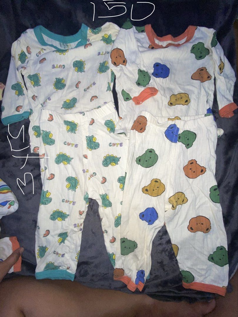 Preloved Girl Clothes (Part3) (Category: Babies & Kids Fashion) located in Manila. Submitted by ea0113 (Listing ID 1459297334, Image 1). Description: - Bundle of 5 baby pajama sets - Long sleeves and pants for full coverage - Cute prints: dinosaur, bear, lion, elephant, panda - Made from soft, comfortable fabric for a good night's sleep - Ideal for daily wear or as a thoughtful baby gift.