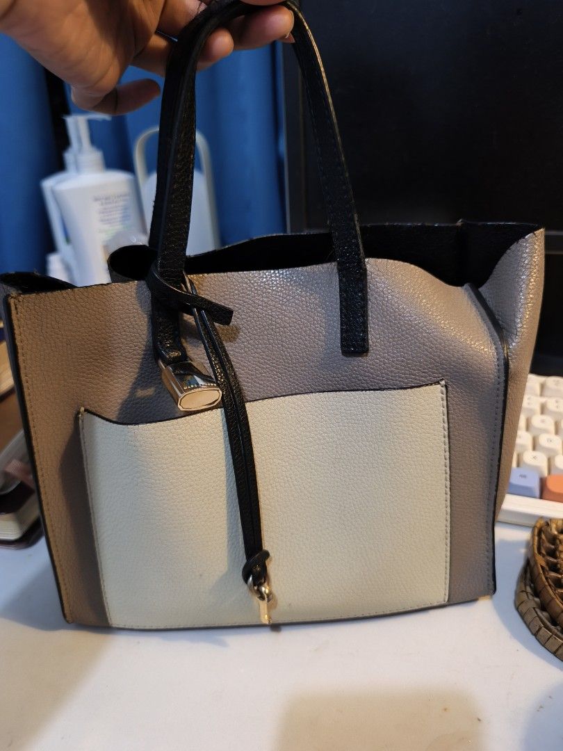preloved marc jacobs hand bag (Category: Luxury Bags & Wallets) located in Malolos. Submitted by demi.stuff (Listing ID 1459409337, Image 1). Description: - Colors: Grey, beige, and cream panels - Black handles - Includes decorative lock and key charm - signs of wear, lower expectations.