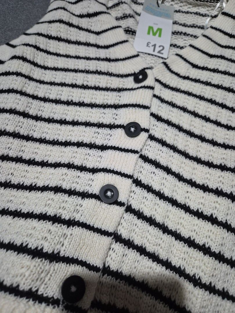 Primark Striped Knit Vest (Category: Sleeveless) located in Taguig. Submitted by chloe_clothingco. (Listing ID 1459392848, Image 2). Description: - Cream and black striped knit vest avail size: small & Med - Button-up front with black buttons - Sleeveless design - Ideal for layering over tops or dresses - Brand new with tags attached.