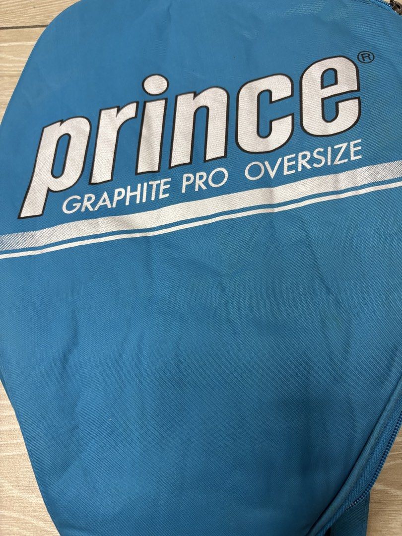 Prince Tennis Racket Case or Cover Bag (Category: Racket and Ball Sports) located in Manila. Submitted by foundhouseph (Listing ID 1459403384, Image 2). Description: - 5pcs. available -Protect your tennis racket with this durable Blue Prince cover. - Designed to fit regular and oversized rackets. - Features a convenient shoulder strap with a buckle for easy carrying. - Secure zipper closure with a branded Prince pull tab. - Ideal for protecting y