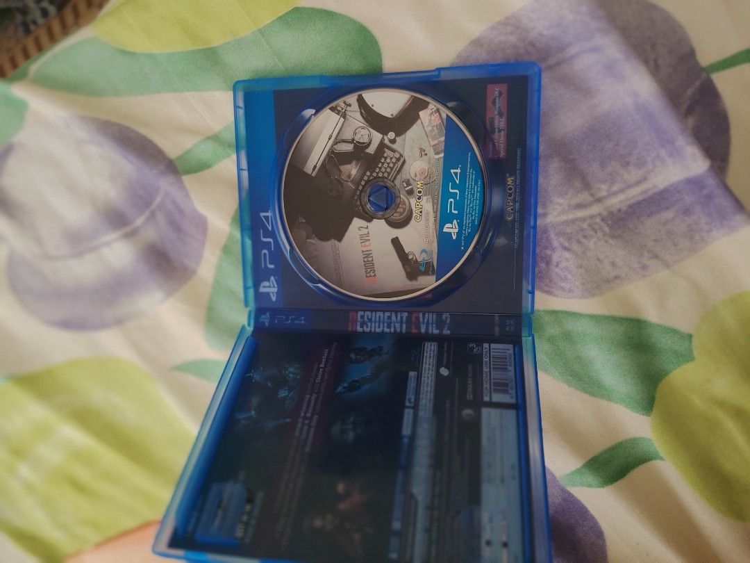 PS4 Games Bundle: Biohazard RE:2, Rayman, Dark Souls Remastered & More (Category: PlayStation) located in Manila. Submitted by brightstorm_f92d6e (Listing ID 1459411331, Image 2). Description: - Bundle of 6 PS4 games - Includes: Biohazard RE:2, Rayman Legends, Dungeon of the Endless, Dark Souls Remastered - Two (2) additional PS4 games included - All discs are for Playstation 4 - Perfect collection for any gamer.