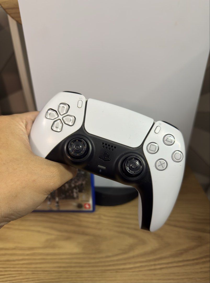 PS5 Phat 825gb disc version with 1 controller + nba (Category: PlayStation) located in Pasig City. Submitted by robbiseraphin (Listing ID 1459370767, Image 2). Description: 🎮 Selling: PS5 Phat 825gb Disc version + 1 controller and NBA 2k25 ✅ Inclusives: - PS5 Phat 825gb (never been opened or repaired) - latest firmware - 1 dualsense controller (no rubber sa analog. Works with no issues) - NBA 2k25 cd - complete wires (HDMI and power chord) - no 