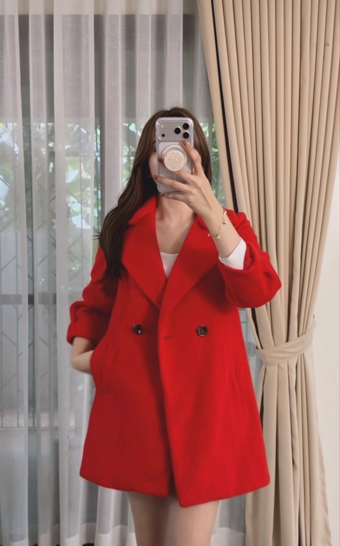 Red Double-Breasted Coat medium (Category: Coats, Jackets and Outerwear) located in Cainta. Submitted by coatclosetph (Listing ID 1459348061, Image 2). Description: - Cute red coat - Double-breasted style with two buttons - Features side pockets - Warm and stylish design - Ideal for cooler weather - Versatile for pairing with different outfits Cainta loc.