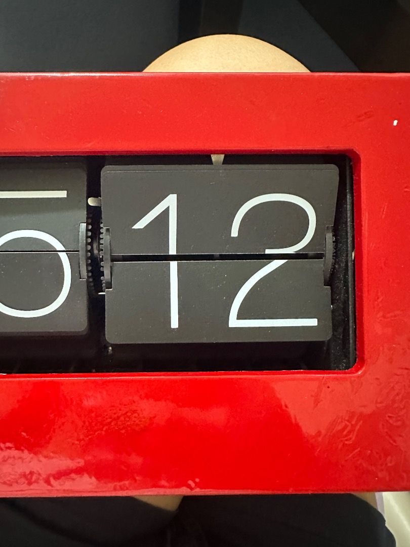 Retro Flip Clock with Red Frame (Category: Clocks) located in Mandaluyong City. Submitted by lovedbyjaaaam (Listing ID 1459235630, Image 3). Description: - Cool retro flip clock - Displays time in AM/PM format - Bright red frame - Ideal for desks or shelves - Adds a vintage vibe to any room - Works well but has 3 damaged number -battery operated.