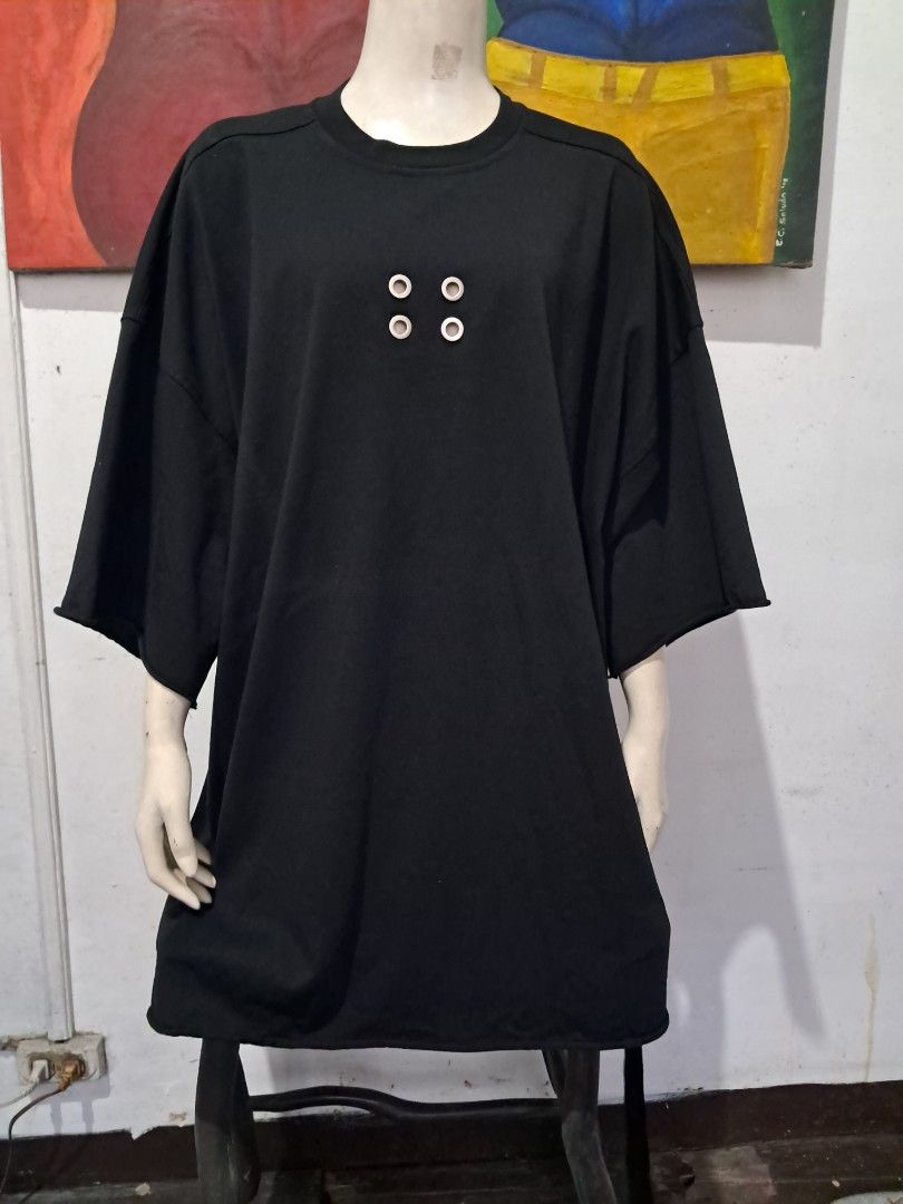Rick Owens oversized T-shirt Black (Category: Tshirts & Polo Shirts ) located in Manila. Submitted by msaludo (Listing ID 1459383789, Image 2). Description: - Authentic Rick Owens Black T-Shirt - Unique silver eyelet details on the chest - Small embroidered patch on the sleeve - Made in Moldova - Distributed by Owenscorp Italia Spa - A must-have addition to your wardrobe.