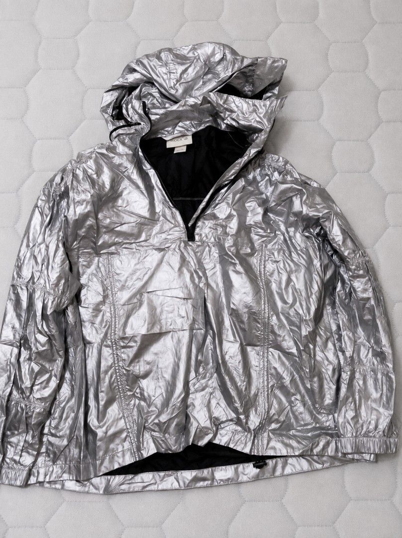 ROCK-B Silver Metallic Anorak Hooded Jacket (Category: Coats, Jackets and Outerwear) located in Binan City. Submitted by vifoxy (Listing ID 1459377535, Image 1). Description: - Cool silver anorak jacket from ROCK-B - Features a hood and half-zip closure - Large front pocket for essentials - Unique crinkled, metallic finish - Elasticated cuffs and hem for a snug fit - Perfect for a stylish statement look - Lightweight and easy to pack.