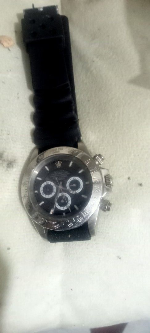Rolex Daytona Black Dial Watch (Category: Luxury Watches) located in Paranaque City. Submitted by dimaguilaa94969 (Listing ID 1459289493, Image 1). Description: - Rolex Daytona watch - Classic black dial - Three functional subdials - Tachymeter bezel for timing pm if int 09260966619 - Comfortable black strap neg ..