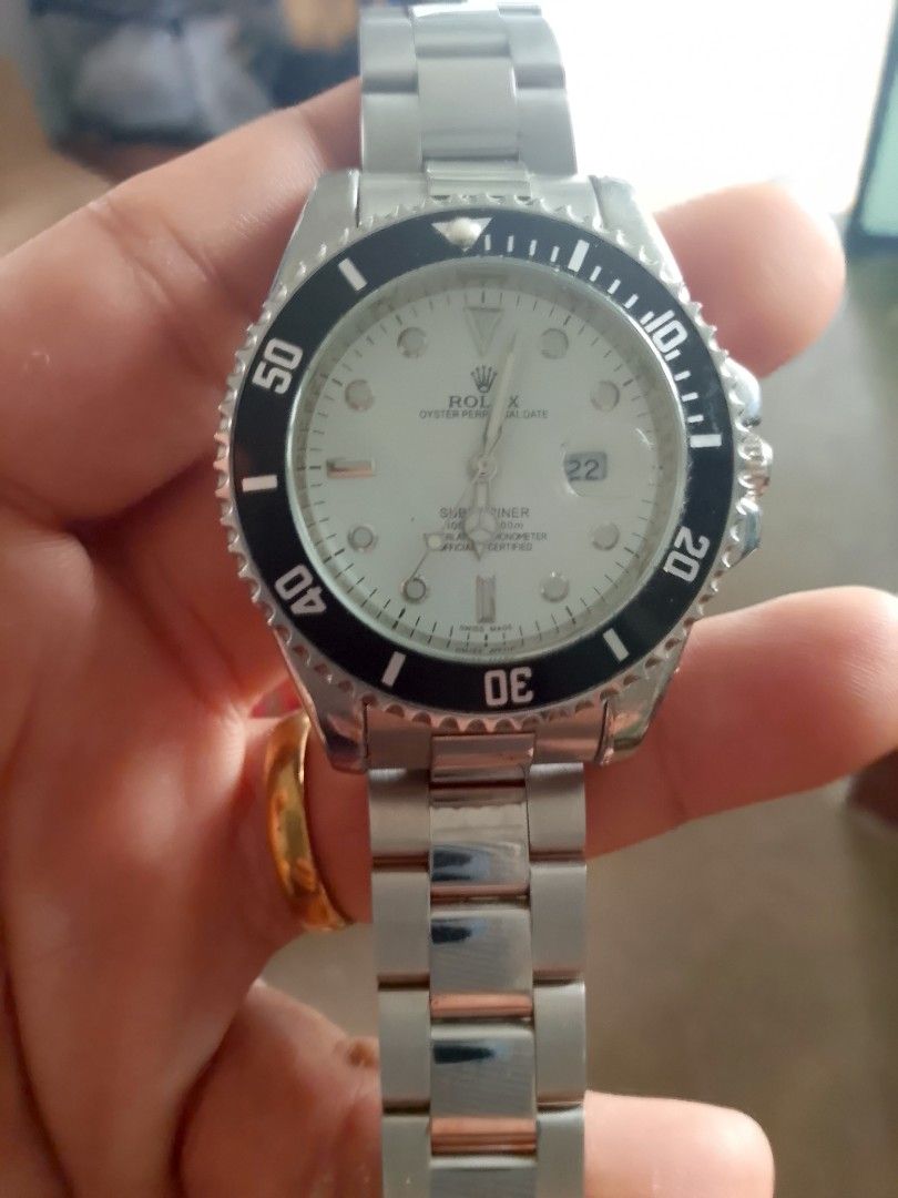 Rolex Oyster Perpetual Date Submariner Watch (Category: Luxury Watches) located in Santa Rosa. Submitted by strangelove10222 (Listing ID 1459489868, Image 1). Description: - Authentic Rolex Oyster Perpetual Date Submariner - Durable stainless steel case and bracelet - Classic black bezel with white markers - Clean white dial featuring a date window - Iconic Rolex crown logo on the clasp - Versatile for both daily wear and special events Class A g