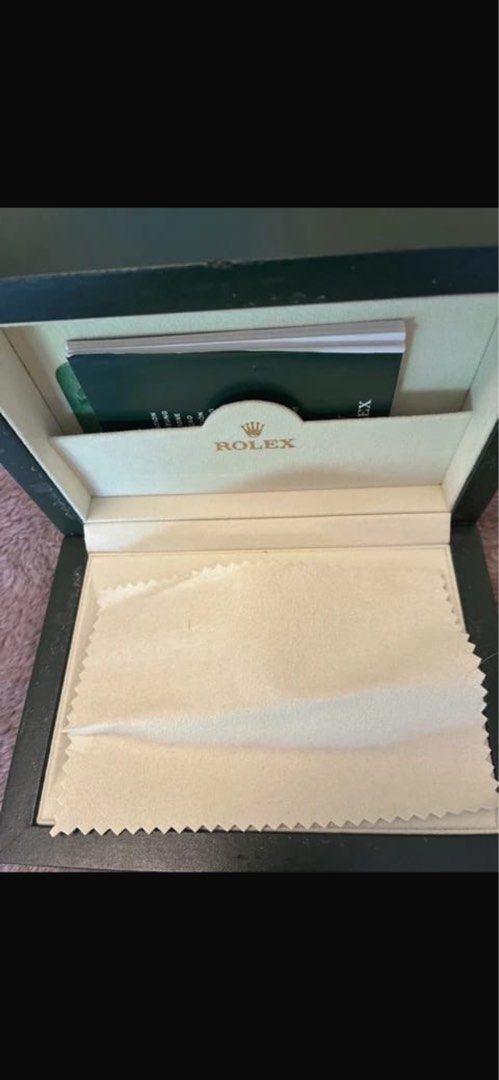 Rolex Oyster Watch with Box and Papers (Category: Luxury Watches) located in Manila. Submitted by trz5jh69sv95845 (Listing ID 1459425986, Image 3). Description: - Authentic Rolex Oyster watch - Includes original box and warranty card - Features a classic black dial - Stainless steel bracelet - All original documentation provided - Extra links included - Ideal for watch enthusiasts and collectors.