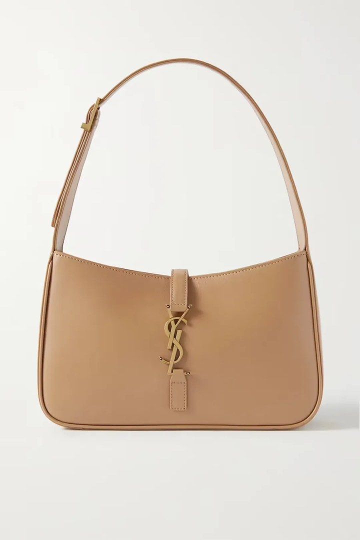 SAINT LAURENT Leather Shoulder Bag (Category: Luxury Bags & Wallets) located in Pasig City. Submitted by leblancxx (Listing ID 1459289062, Image 1). Description: SAINT LAURENT’s shoulder bag has a sleek, minimal silhouette that calls to mind coveted ‘90s styles. It is from ‘Dune’ leather, it’s adorned with the house’s signature ‘YSL’ plaque and has plenty of space for your phone, keys and cardholder. You can easily adjust the buckled strap to you