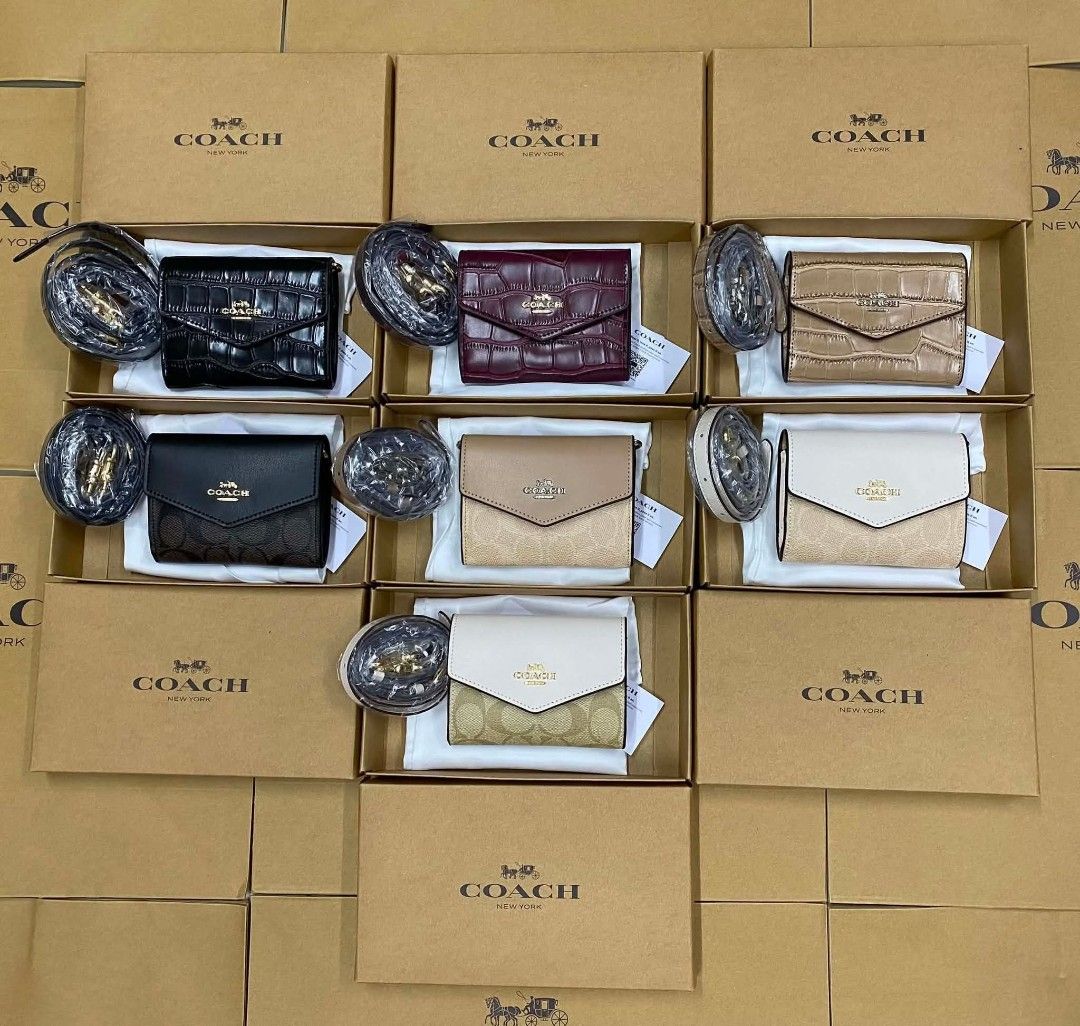 Sale! Coach Mini Envelope Wallet with strap sling (Category: Wallets & Card holders) located in Mandaluyong City. Submitted by priceles (Listing ID 1459418591, Image 1). Description: Brand New with inclusions Good for gifts and everyday Use NO COD.