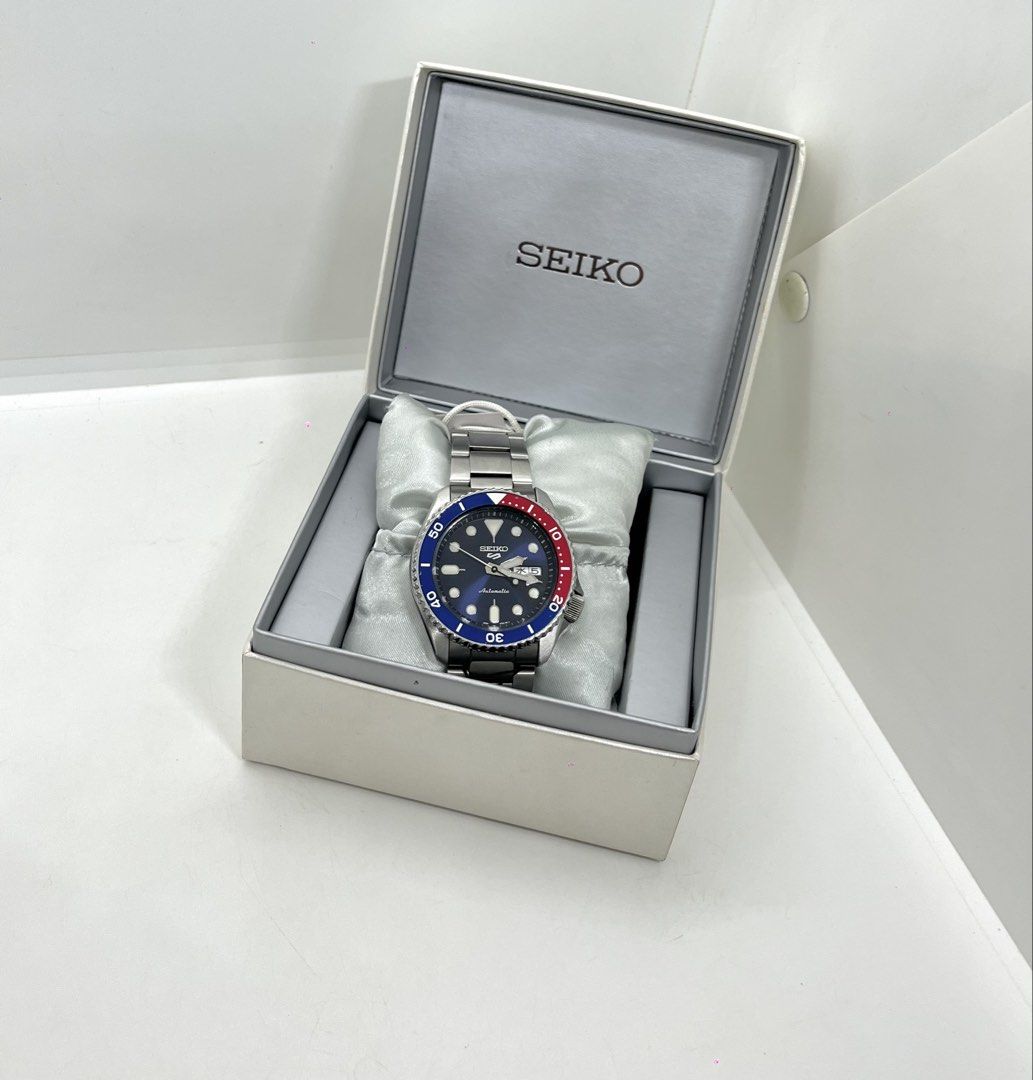 Seiko 5 Sports Pepsi (Category: Men's Watches) located in Bacoor. Submitted by truecrease (Listing ID 1459320570, Image 1). Description: Seiko 5 Sports Pepsi Ref no: SRPD53K1 Used (9.5/10 Condition Very Small Damage At Bezel) Complete Set Asking price: ₱9,788 (WAY BELOW SRP) SRP: ₱16,779 Caliber No: 4R36 Movement: Automatic With Manual Winding Case size: 42mm Power reserve Approx. 41 hours.