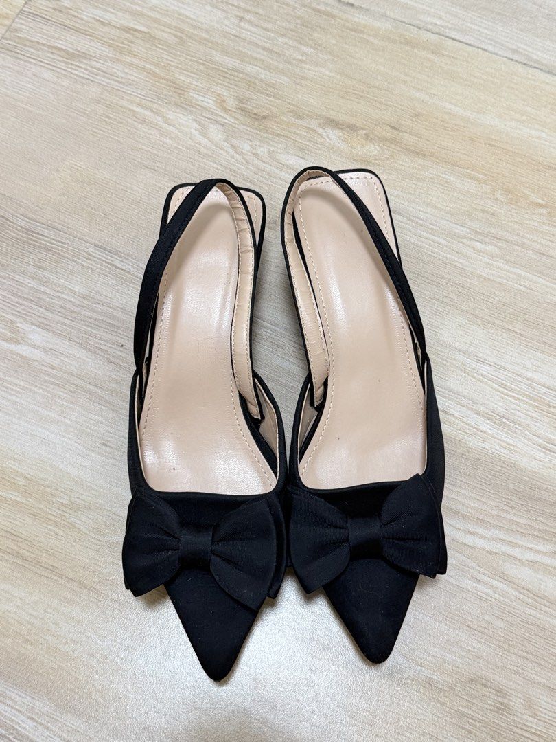 Shein Black Slingback Kitten Heels with Bow (Category: Heels) located in Pasig City. Submitted by cutiesashimi (Listing ID 1459361934, Image 2). Description: Size US 6-6.5W, UK 4, EU 37, 23.5CM used once, excellent condition - Cute black slingback heels - Pointed toe with a bow detail - Low, comfortable heel for easy walking - Elastic strap at the back for a secure fit - Perfect for dressing up or down.