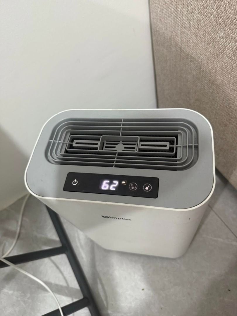 Simplus Dehumidifier (Category: Air Purifiers & Dehumidifiers) located in Baler. Submitted by gemsandrare (Listing ID 1459485727, Image 3). Description: - Simplus Dehumidifier - Displays current humidity level - Easy-to-empty removable water tank - Minor cosmetic scratches on exterior - Fully functional and works well.