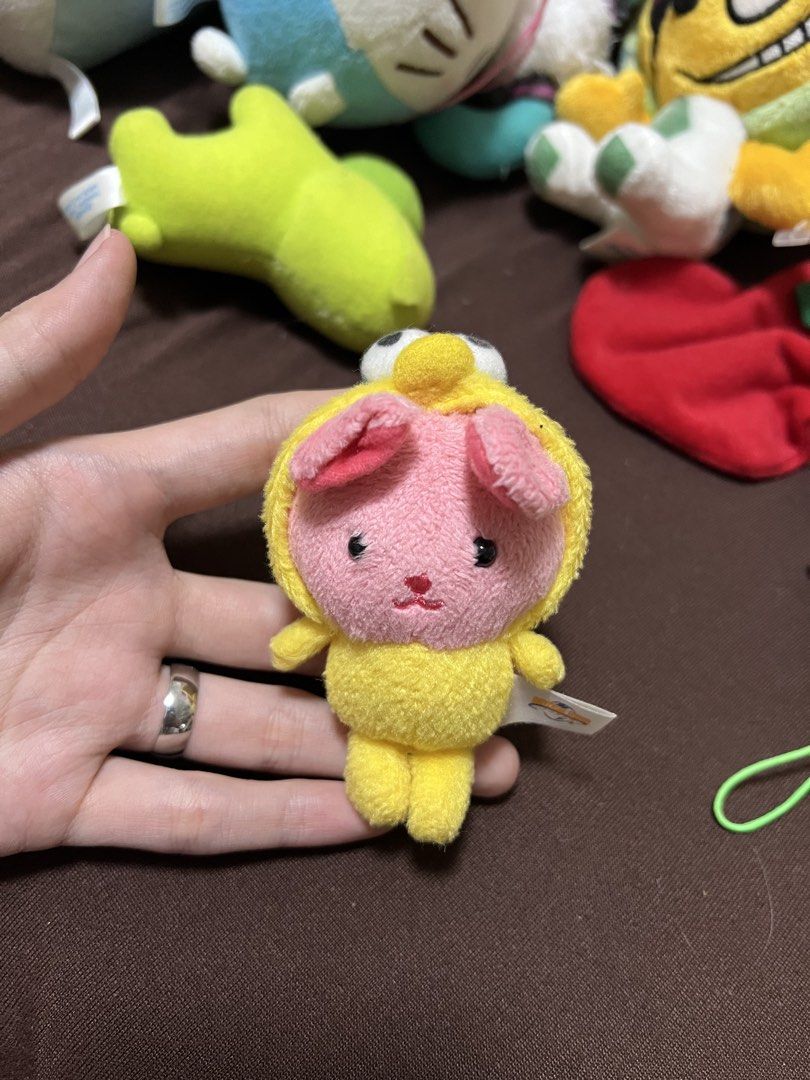 small, pink cartoon character plush keychain (Category: Plushies & Soft Toys) located in Manila. Submitted by erickalago (Listing ID 1459457255, Image 1). Description: no issue loc: manila & makati.