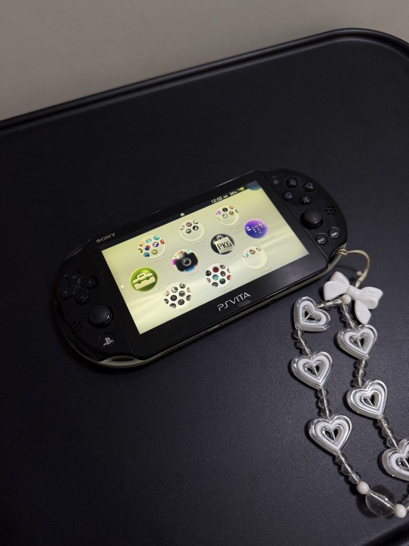 Sony PS Vita Black (Category: PlayStation) located in Manila. Submitted by mitsuhamiyamizu25 (Listing ID 1459320844, Image 2). Description: PS Vita Slim (Black) ✅ 128 GB ✅ Unit modded / CFW ✅ With minimal issues - Right speaker slightly garbled - Slight LCD dimming on the sides ✅ With charger.