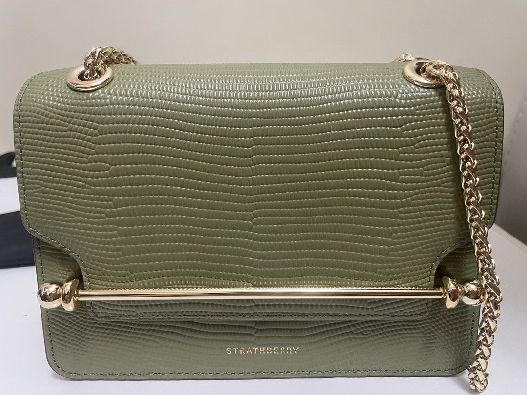Strathberry East/West Mini (Category: Luxury Bags & Wallets) located in Taguig. Submitted by kureia26 (Listing ID 1459349158, Image 2). Description: I’m selling my Strathberry East/West Mini in olive green lizard-embossed leather finish. Bought this in Zalora Luxury on sale around 20k (Original price is 32k).