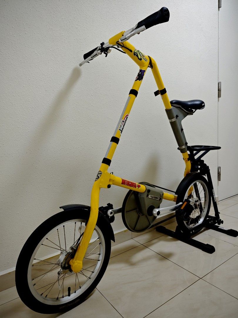 STRIDA (Category: Bicycles) located in Singapore. Submitted by is7777 (Listing ID 1459313675, Image 3). Description: – Iconic folding design — folds in seconds, super easy to carry.Lightweight & compact — perfect for MRT, bus, condo storage, car boot.Clean belt‑drive — no grease, low maintenance, smooth ride.Well‑used but reliable — cosmetic wear expected; still functions well.Great for city commuting — ideal for short trips and daily errands.Uni