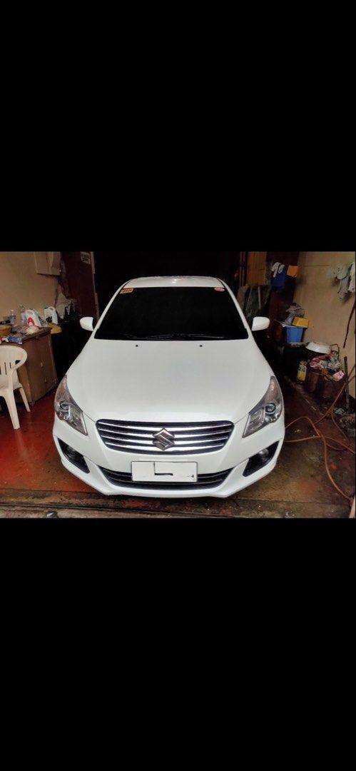 Suzuki Ciaz Gl automatic Auto (Category: Used Cars) located in Manila. Submitted by luisadavid626 (Listing ID 1459315672, Image 3). Description: 50k mileage Casa maintained Complete records First owner Magic tint 3M Negotiable for sure buyer Doctor owned Honest issues :key cover broken but with 2 silicone cases so di na siya matanggal small crack since plastic due to katagalan :aircon vent one side plastic louver broken but usable not as smooth n