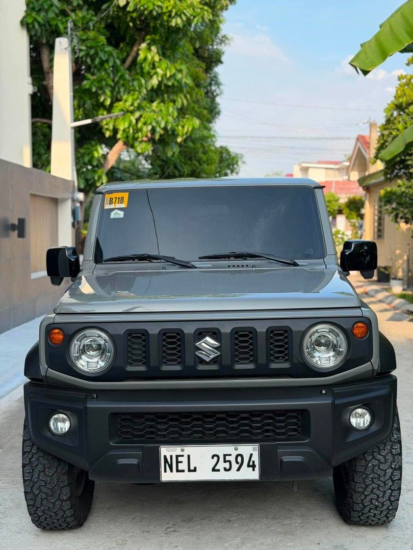 Suzuki Jimny GLX 4x4 Auto (Category: Used Cars) located in Quezon City. Submitted by nyelly01 (Listing ID 1459419459, Image 1). Description: Suzuki Jimny 2021 GLX A/T 4x4 Japan Built 2nd Owner Upgrades: 350k total Orig Japan Rays Gram Lights Mags 5pcs (100k) Wrapped with bnew BFG tires 5pcs yr 2024 (100k) Leather Seats (8k) center rest console (2k) 2-1 color Fog lamps (bright white and fog yellow) Speed sensing locking module (3k) Tow Hitch (15k)