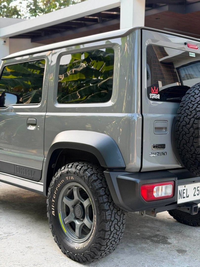 Suzuki Jimny GLX 4x4 Auto (Category: Used Cars) located in Quezon City. Submitted by nyelly01 (Listing ID 1459419459, Image 3). Description: Suzuki Jimny 2021 GLX A/T 4x4 Japan Built 2nd Owner Upgrades: 350k total Orig Japan Rays Gram Lights Mags 5pcs (100k) Wrapped with bnew BFG tires 5pcs yr 2024 (100k) Leather Seats (8k) center rest console (2k) 2-1 color Fog lamps (bright white and fog yellow) Speed sensing locking module (3k) Tow Hitch (15k)