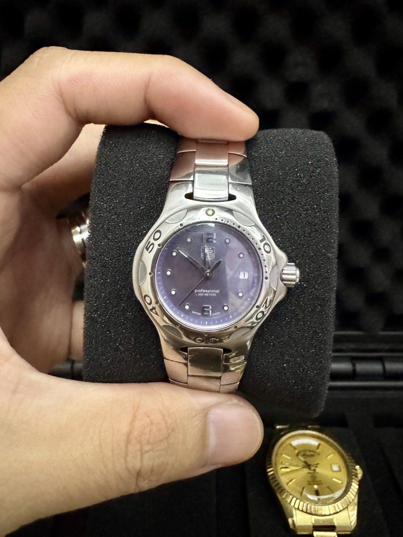 Tag Heuer Kirium Professional (Category: Luxury Watches) located in Taguig. Submitted by miltimepieces (Listing ID 1459382022, Image 1). Description: Tag Heuer Kirium Professional • Year: 1990s-2000s • Swiss Made • Quartz Movement • Iridescent Purple Mother-of-Pearl Dial • Date Display • Unidirectional Bezel with Markers • 28mm Case Size • Stainless Steel • Naked Meet-up: BGC Shipping: LBC Nationwide Same-Day Delivery: Grab (within serviceable ar