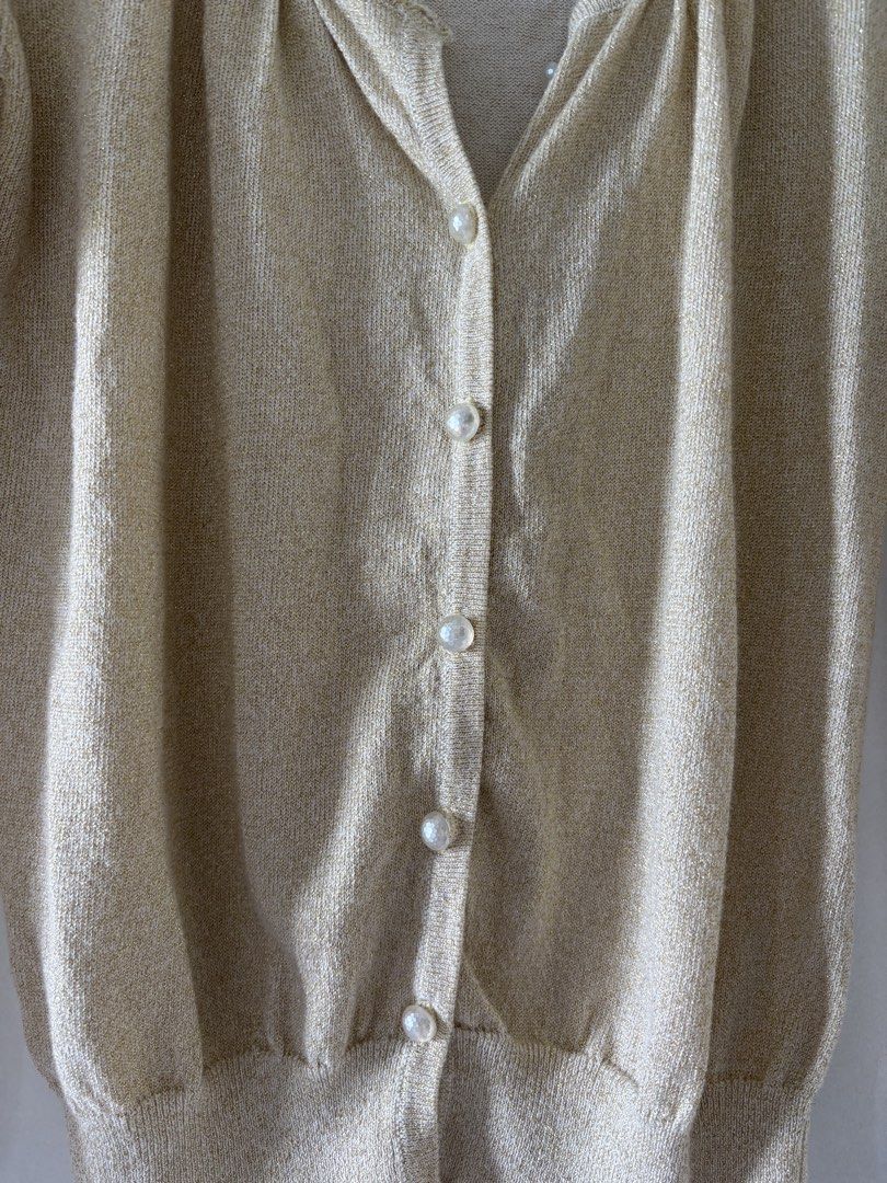 THRIFTED gold cardigan (Category: Coats, Jackets and Outerwear) located in Quezon City. Submitted by iwishyoutulips (Listing ID 1459432399, Image 2). Description: - so so cute - thin and breathable - fabric is a bit itchy but tolerable mop: gcash/bank transfer mod: jnt/lalamove tags: coquette sawako aesthetic cute dollete uniqlo h&m zara cotton on bebe vintage.