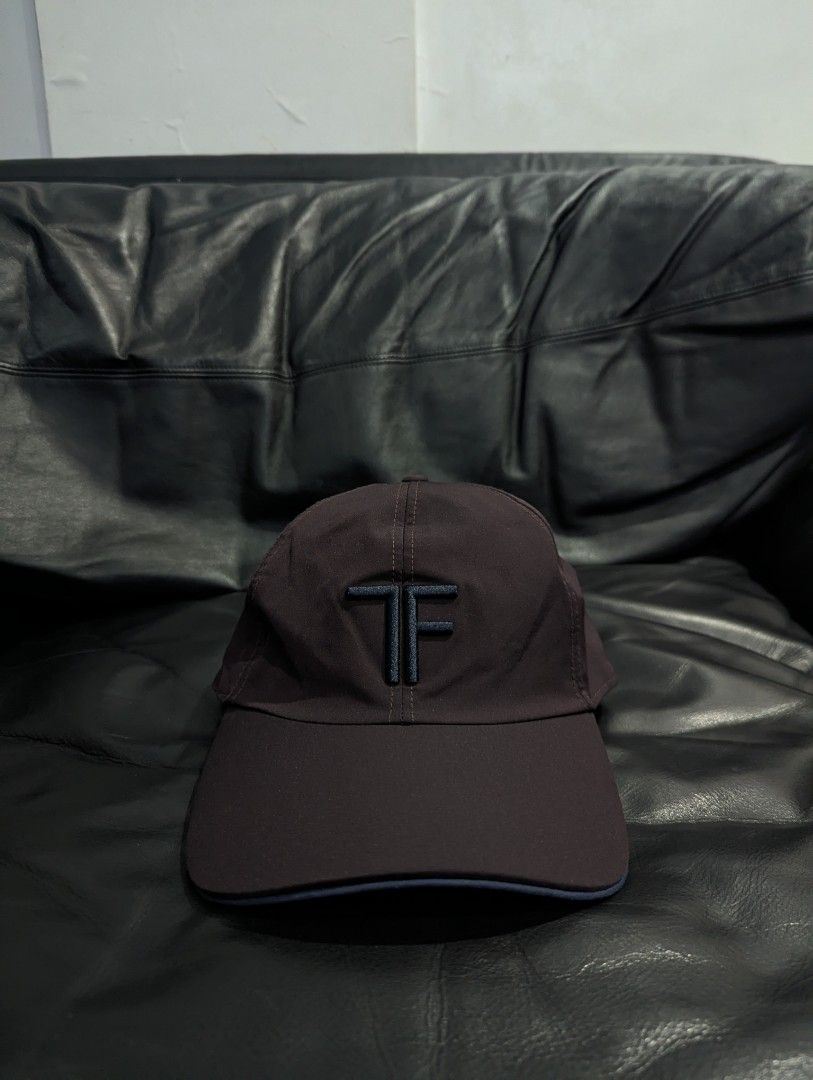 Tom Ford TF Embroidered Baseball Cap (Category: Caps & Hats) located in Antipolo. Submitted by bentakahitanoano (Listing ID 1459410628, Image 1). Description: Tom Ford TF Logo Embroidered Baseball Cap. Epitomizing refined, minimalist luxury, this Italian-made hat blends high-end craftsmanship with casual streetwear aesthetics. Still in great shape Worn a few times Smooth finish material Water-resistant Retail around 450+ usd.