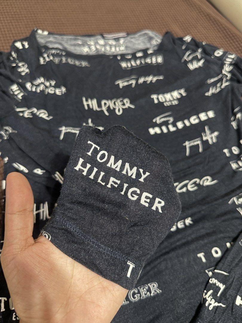Tommy Hilfiger All Over Logo Long Sleeve (Category: Tshirts & Polo Shirts ) located in Manila. Submitted by oja02 (Listing ID 1459290300, Image 3). Description: Tommy Hilfiger All Over Logo Long Sleeve Color: Navy Blue Material: Soft and stretchy fabric Size: Small on tag but can fit up to Medium Unisex Brand New. Never worn Loc: Manila.