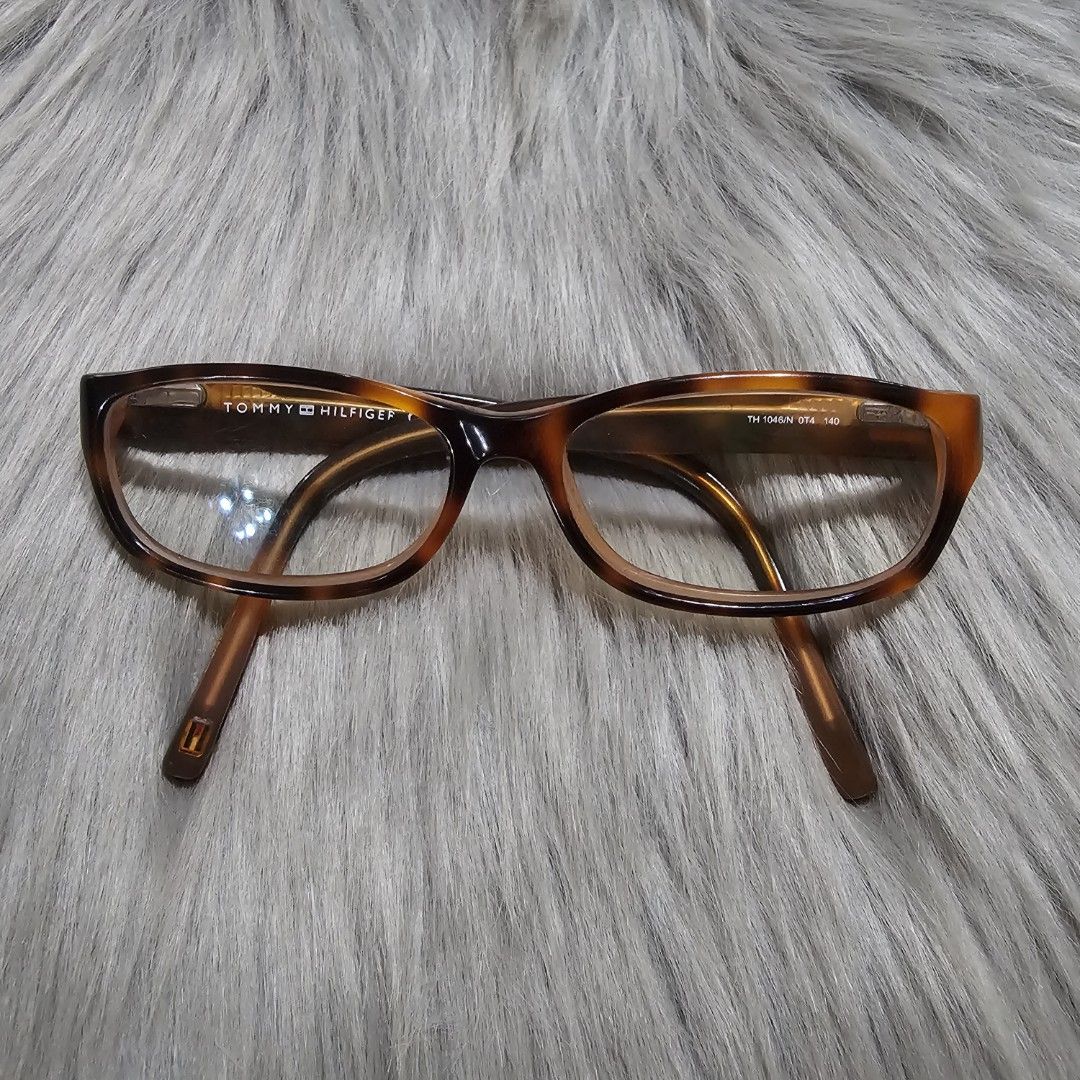 TOMMY HILFIGER TORTOISE PATTERN EYEGLASS (Category: Sunglasses & Eyewear) located in Subic. Submitted by chichayscloset2021 (Listing ID 1459356676, Image 1). Description: FULL RIM OPTICAL FRAMES REPLACEABLE LENSES NO BOX.
